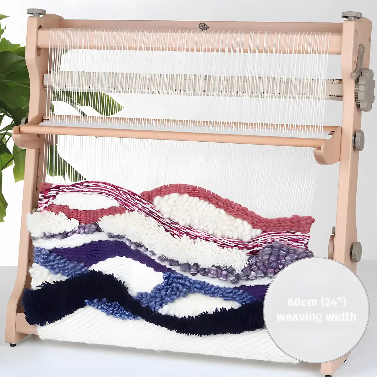Weaving loom with colorful fabric on a white background