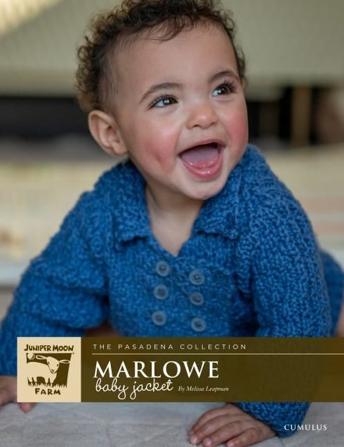 Baby wearing Juniper Moon Marlowe jacket