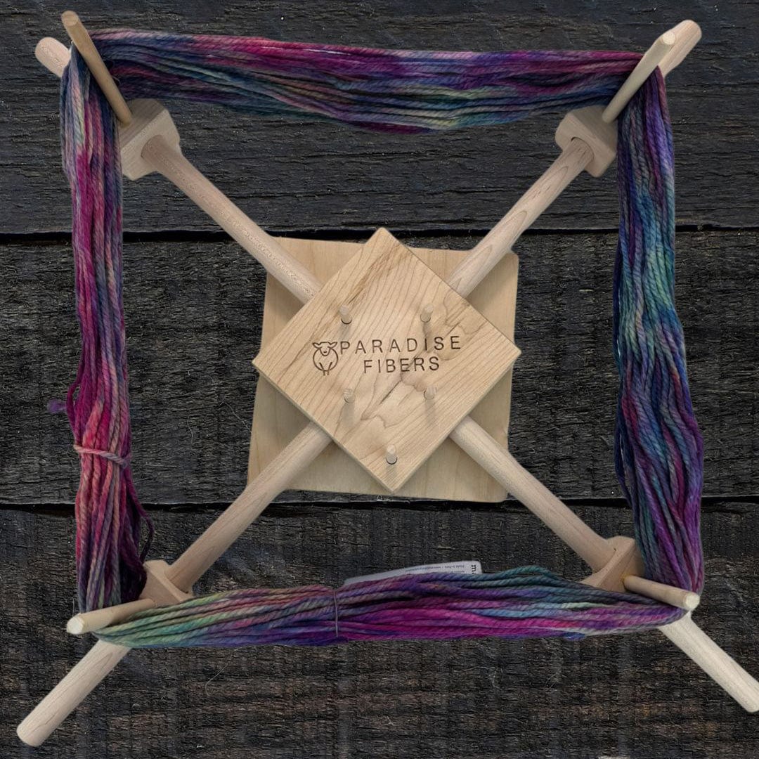 Paradise Fibers yarn winder with colorful yarn