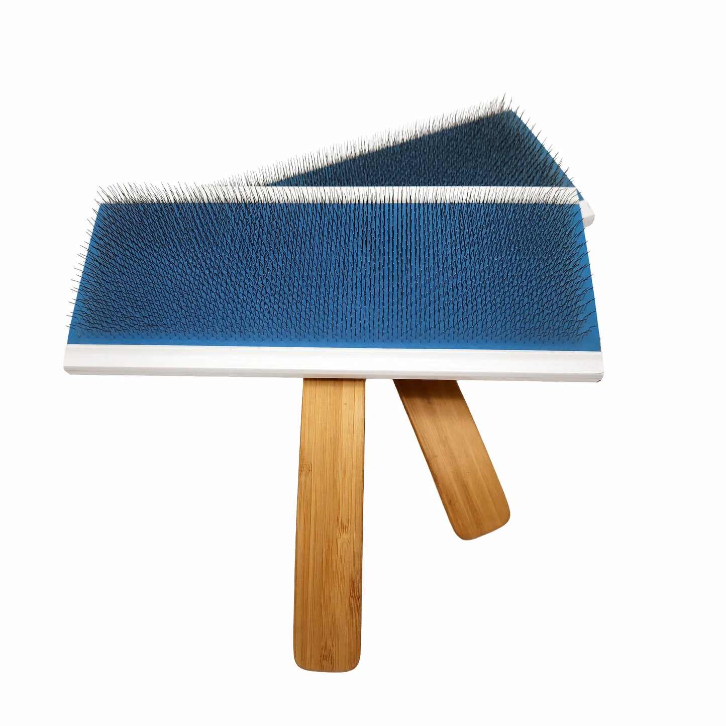 Majacraft Hand Carders laid against each other showing the blue backing cloth