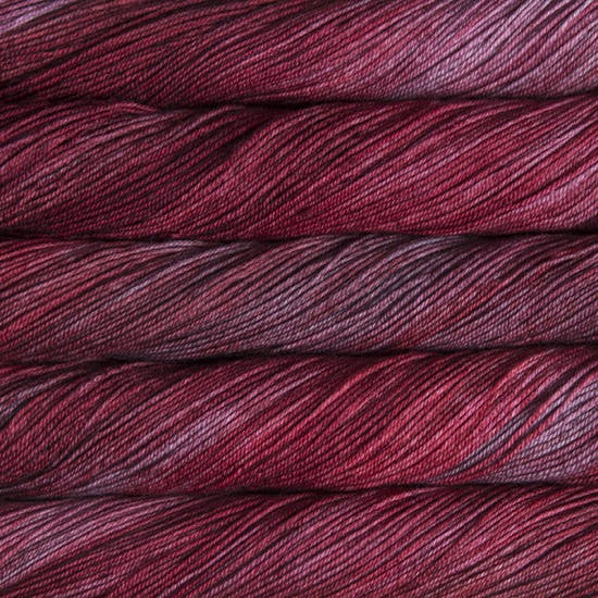 Malabrigo Sock Yarn in Cereza - a variegated maroon and purple colorway