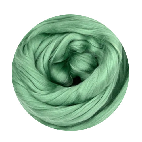 Color Canberra Green. A light shade of green mulberry silk top.