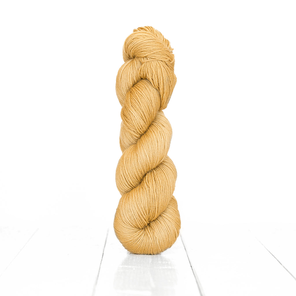 Color Acorn, hand-dyed skein of yarn, warm beige color produced from natural acorns.