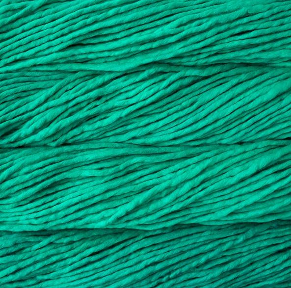 Color: Bahamas Green 600. A bright teal variant of Malabrigo Rasta yarn. 
