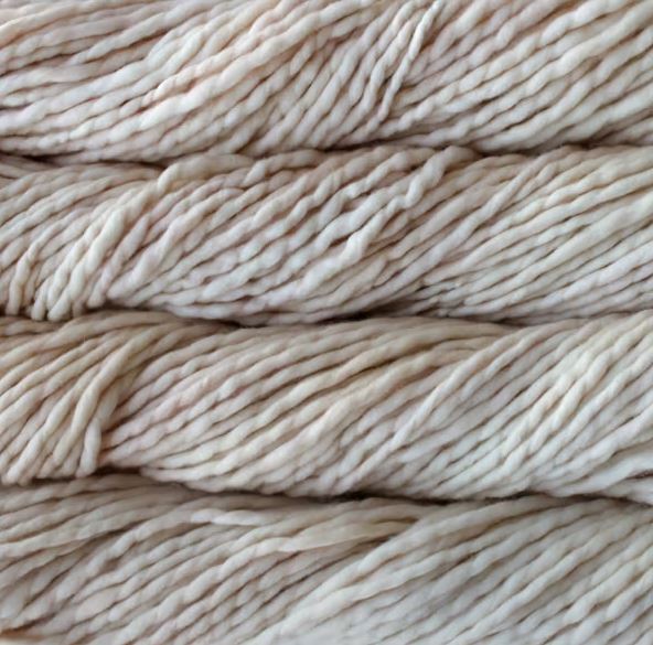 Color: Ivory 704. An ivory variegated variant of Malabrigo Rasta yarn. 