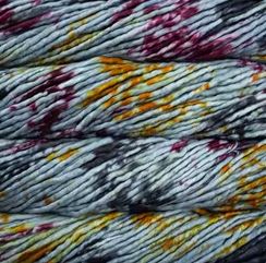 Color: Pintada Tundra 182. A grey, pink and yellow variant of Malabrigo Rasta yarn. 