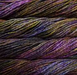 Color: Queguay 877. A purple, light green, and gold variegated variant of Malabrigo Rasta yarn. 
