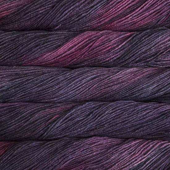 Malabrigo Arroyo Yarn Purpuras 872 - a variegated purple and magenta colorway