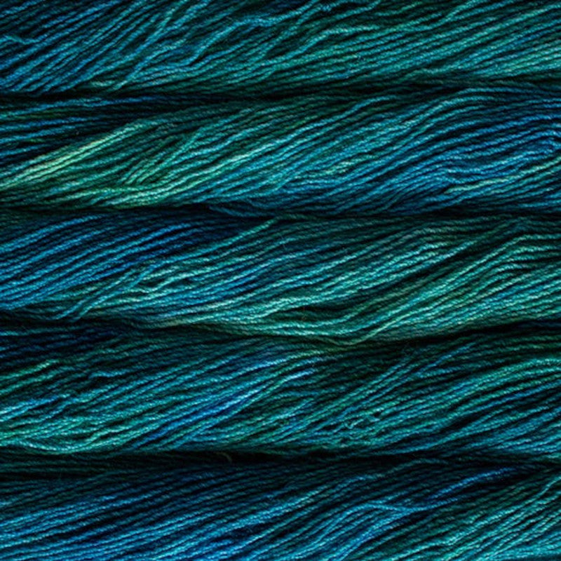 Malabrigo Dos Tierras DK Yarn in Solis - a variegated teal and blue colorway