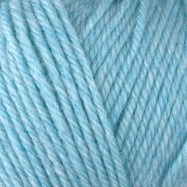Breeze 33163, a heathered bright blue skein of washable worsted weight Ultra Wool yarn.