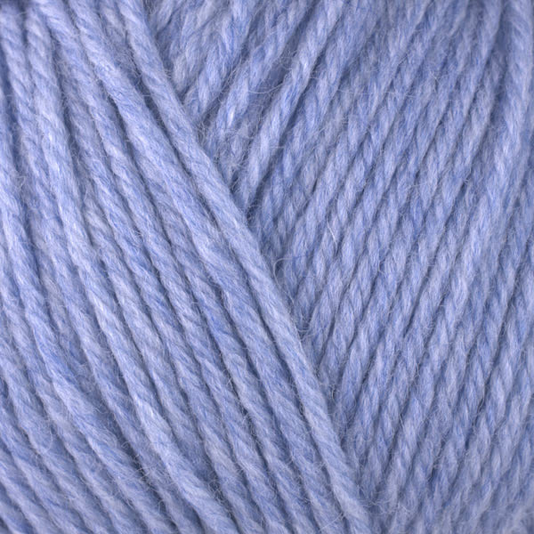 Forget-Me-Not 33162, a light heathered blueish purple skein of washable worsted weight Ultra Wool yarn.