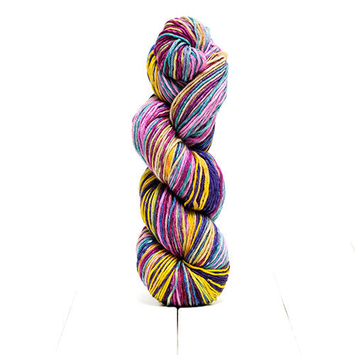 Color 6026, hand-dyed yarn in self-striping shades of pinks, yellows, and blues.