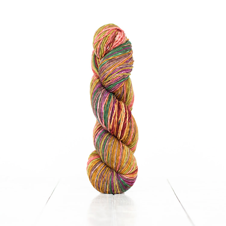 Color 6008, hand-dyed yarn in self-striping shades of gold, salmon, green, purple, & maroon.
