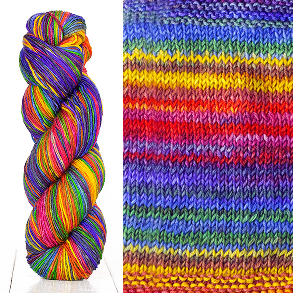 Color 3004: a hand-dyed skein of self striping wool yarn with blue, red, white, and yellow shades