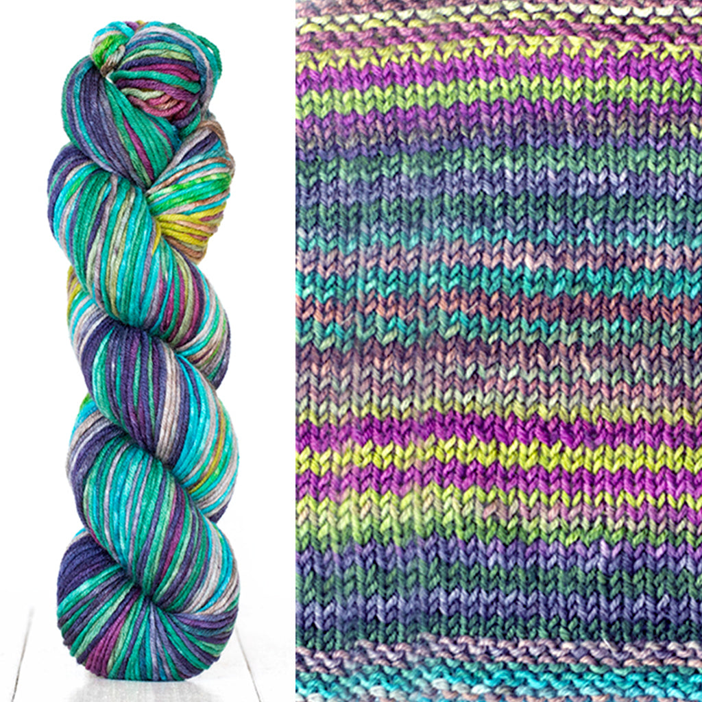 Color 4012: a hand-dyed skein of self striping wool yarn with blue, purple, green, and yellow shades