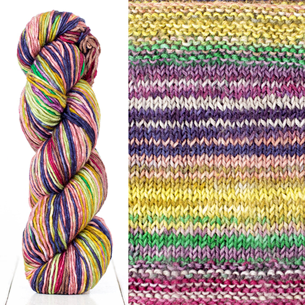Color 4018: a hand-dyed skein of self striping wool yarn with purple, yellow, green, and red shades