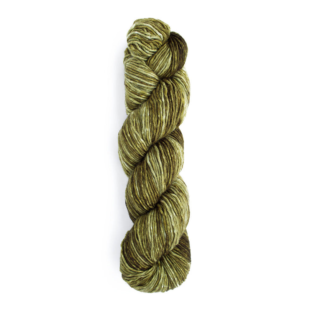 A skein of Monokrom Worsted, color 4059, a tonal, rustic, sage green.