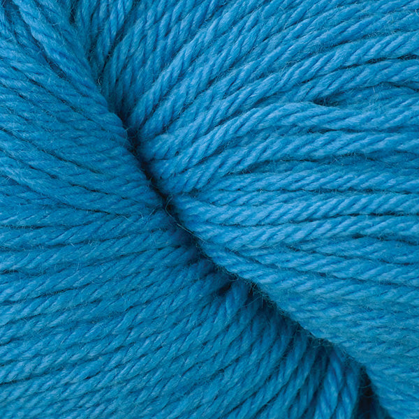 Berroco Vintage Worsted weight yarn in the color Electric Horizon Blue 51134, a bright candy blue.