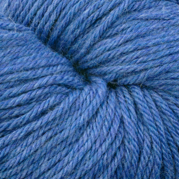 Berroco Vintage Worsted weight yarn in the color Sapphire 5170, a vibrant heathered blue.