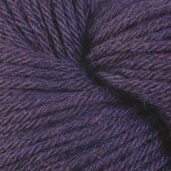 Berroco Vintage Worsted weight yarn in the color Aubergine 5190, a dark heathered purple.