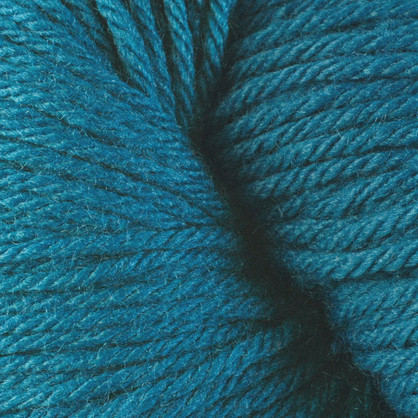 Berroco Vintage Worsted weight yarn in the color Neptune 5197, an ocean blue.