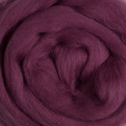 Color Berry. A dark purple red shade of solid color merino wool top.