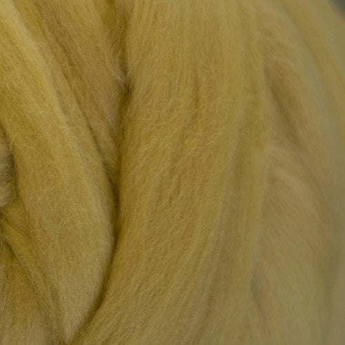 Color Camel. A light yellow brown shade of solid color merino wool top.