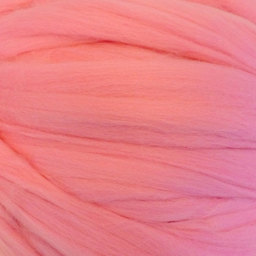Color Camellia. A light medium pink shade of solid color merino wool top.