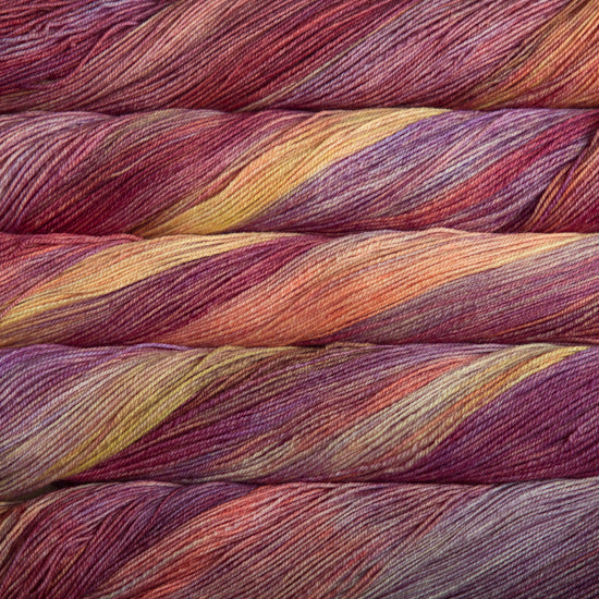 Malabrigo Sock Yarn in Archangel - a variegated purple, orange and yellow colorway