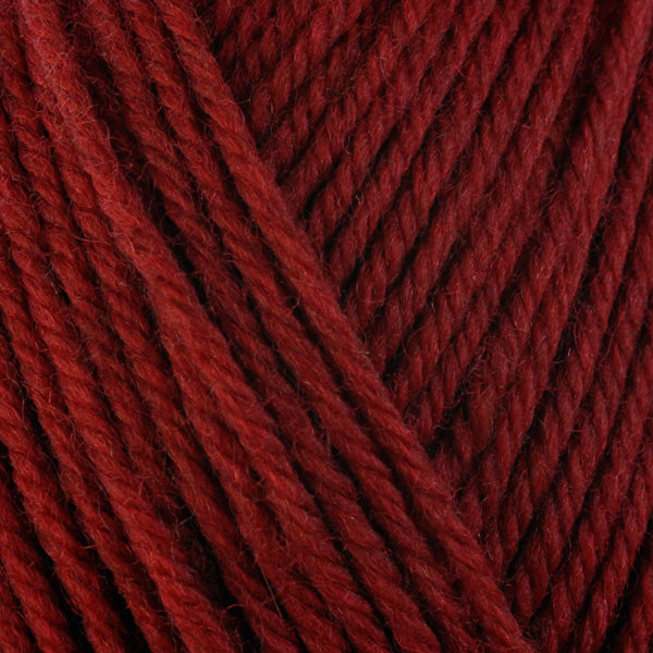 Brandy Wine 33133, a rich red skein of washable worsted weight Ultra Wool yarn.