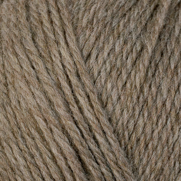 Driftwood 83104, a natural light brown skein of washable DK weight Ultra Wool yarn.