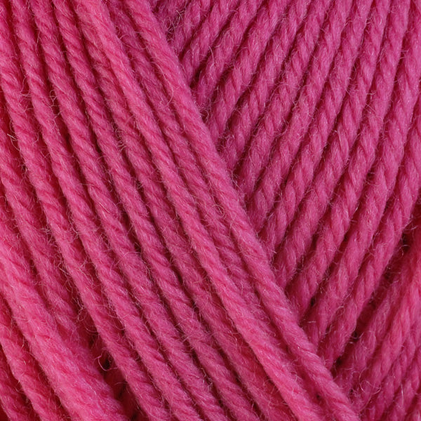 Hibiscus 3331, a bright pink skein of washable worsted weight Ultra Wool yarn.