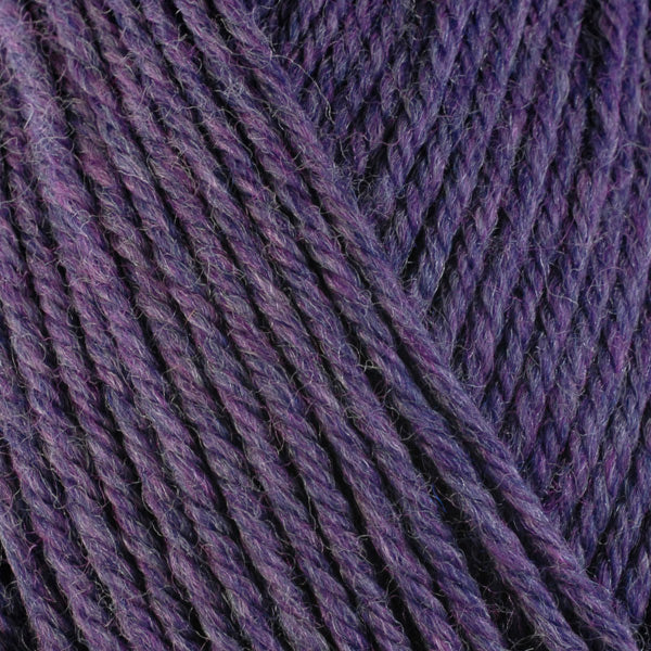 Lavender 33157, a deep heathered purple skein of washable worsted weight Ultra Wool yarn.