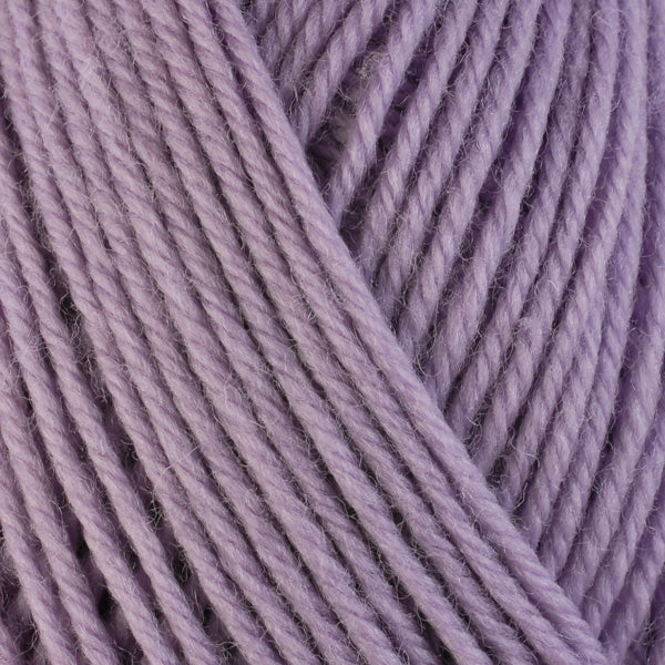 Lilac 3314, a light purple skein of washable worsted weight Ultra Wool yarn.