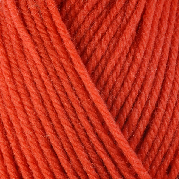 Nasturtium 3336, a bright orange skein of washable worsted weight Ultra Wool yarn.