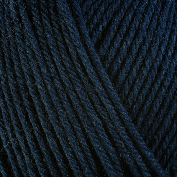 Navy 3363, a dark blue skein of washable worsted weight Ultra Wool yarn.