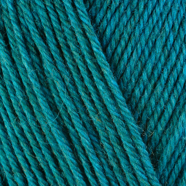 Verbena 33139, a heathered bright turquoise blue skein of washable worsted weight Ultra Wool yarn.