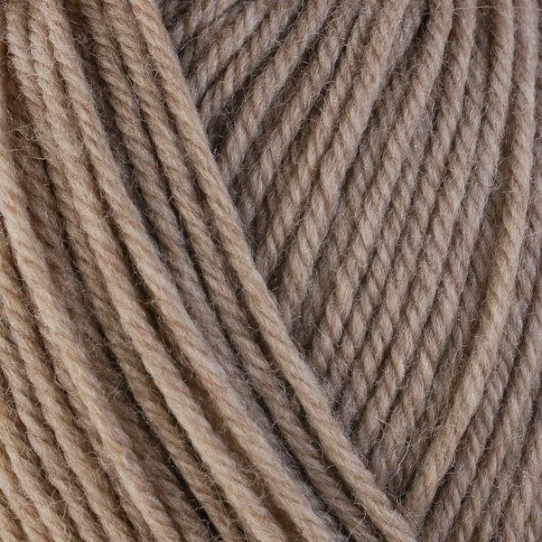 Wheat 33103, a light tan skein of washable worsted weight Ultra Wool yarn.