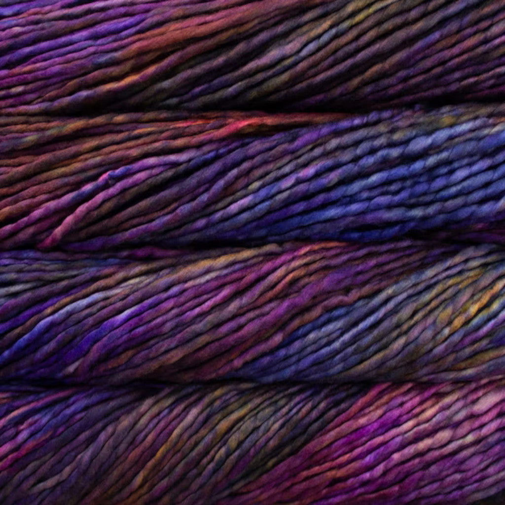Color: Talisman 249. A purple, blue, pink and brown variegated variant of Malabrigo Rasta yarn. 