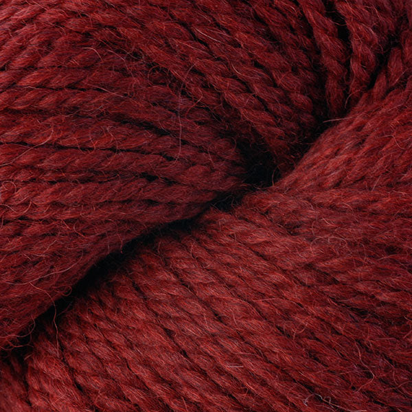 Redwood Mix 7281, a dark heathered red skein of Ultra Alpaca Chunky.