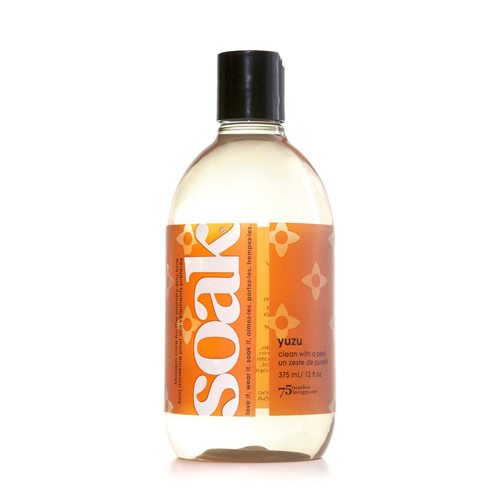 A 12 oz bottle of Yuzu scented SOAK Wash.
