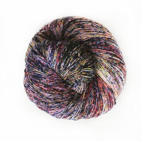 Malabrigo Mechita Renaissance Yarn - a speckled white, yellow, blue and pink colorway