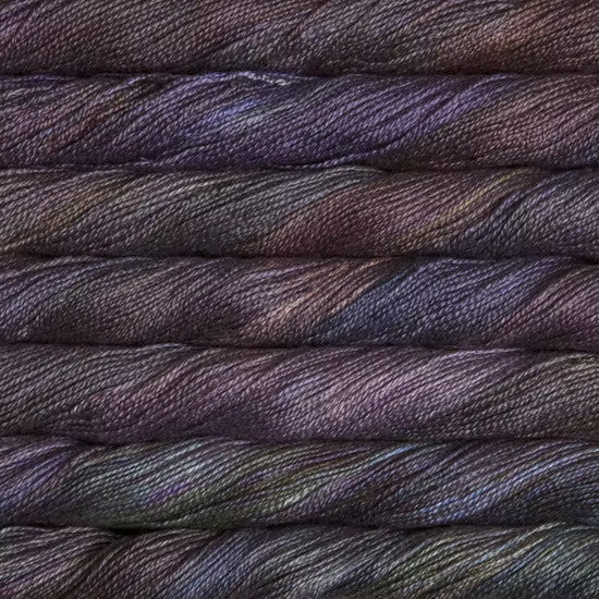 Malabrigo Mora Fingering in Zarzamora - a variegated purple, blue and faded green colorway