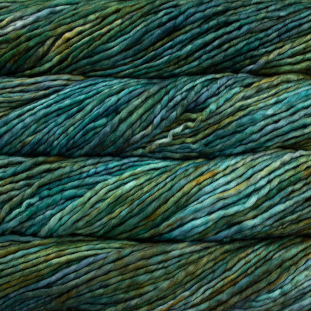 Color: Draco 190. A teal and greenish yellow variegated variant of Malabrigo Rasta yarn. 