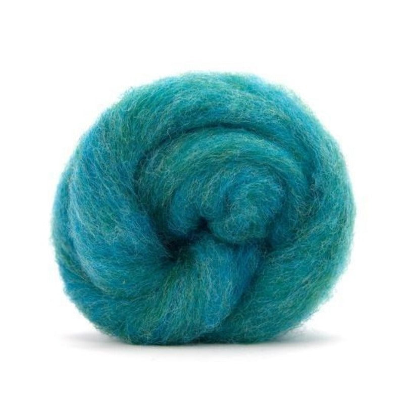 A turquoise blue shade of carded corriedale wool roving.
