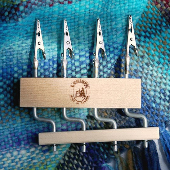 Laclare quad yarn holder on colorful fabric