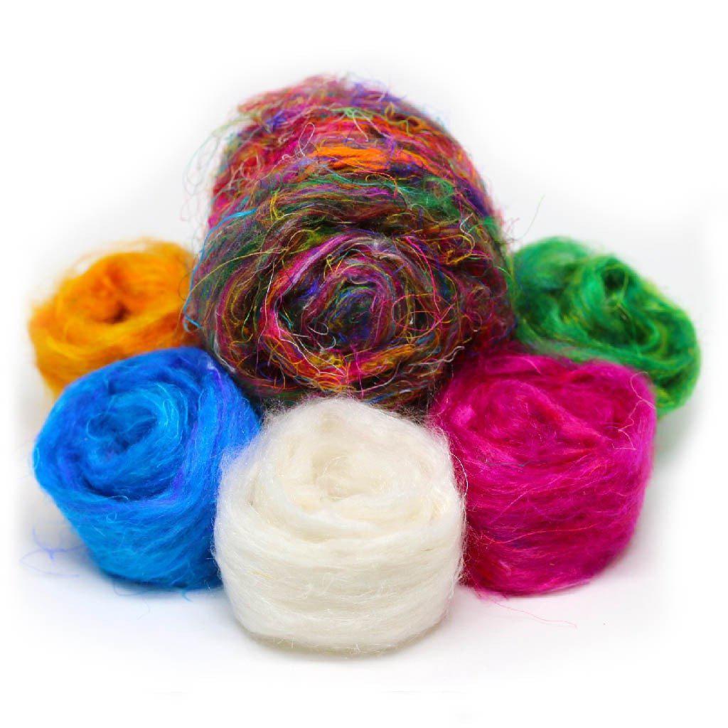 A colorful pile of Recycled Sari Silk Roving.