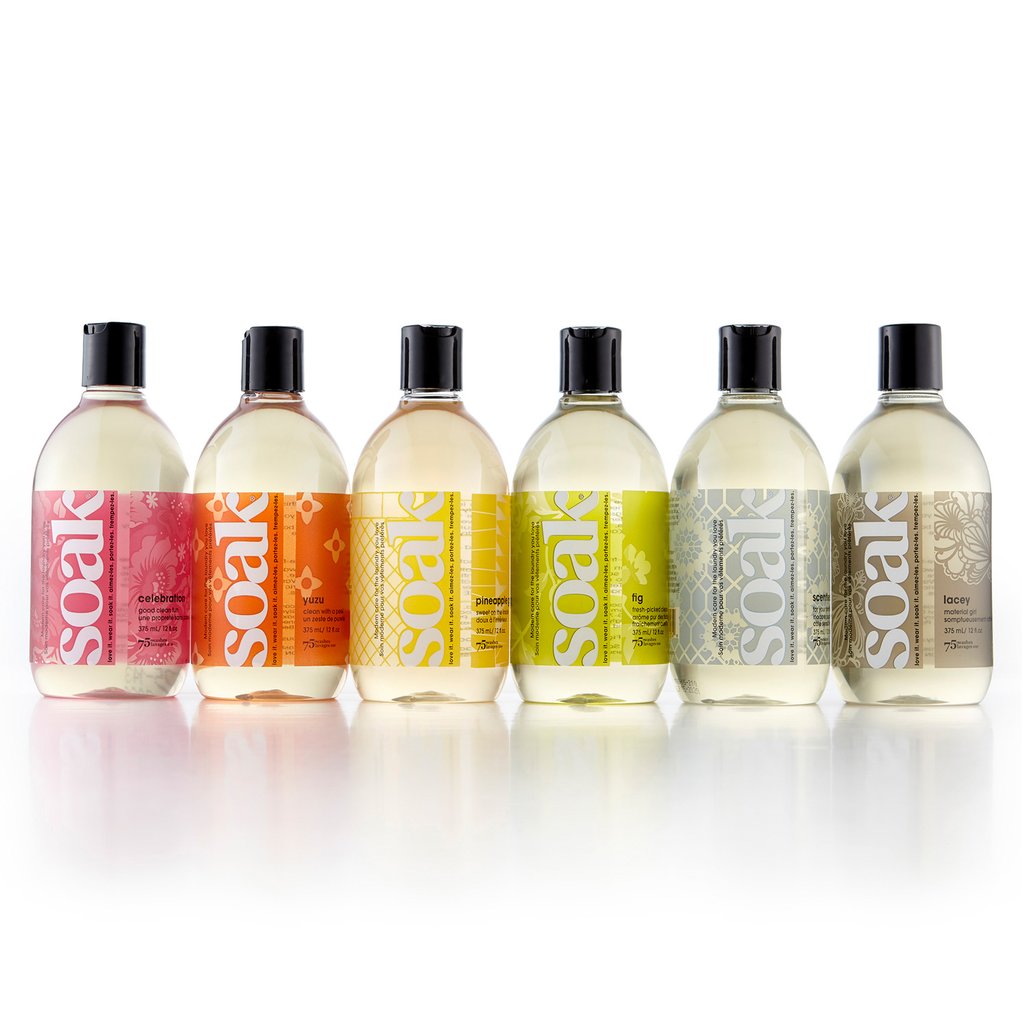 12 oz bottles of SOAK wash in the scents Celebration, Yuzu, Pineapple Grove, Fig, Scentless, and Lacey.