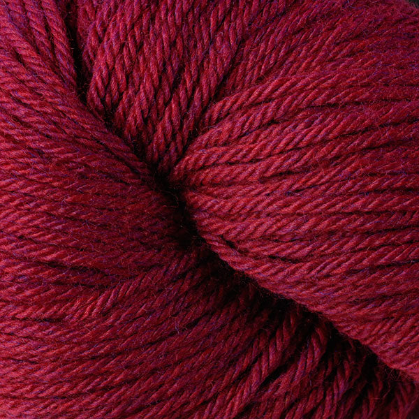 Berroco Vintage Worsted weight yarn in the color Ruby 51181, a rich heathered red.