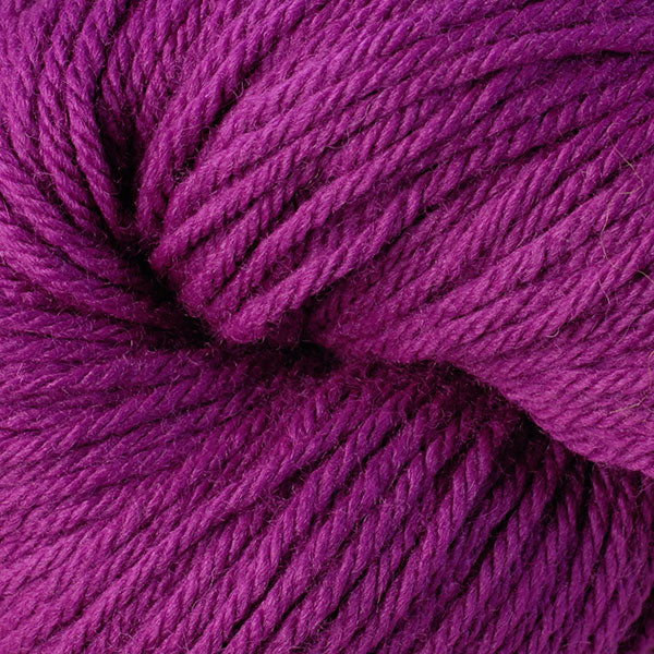 Berroco Vintage Worsted weight yarn in the color Dewberry 5167, a bright pinkish purple.